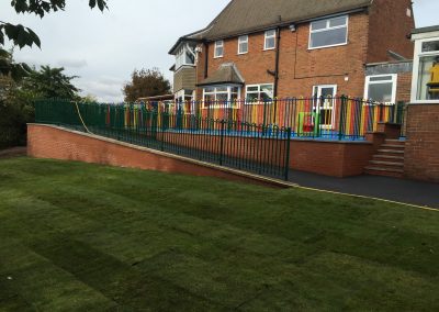 IMG_1975 Asphalt surfacing and fencing for play area.