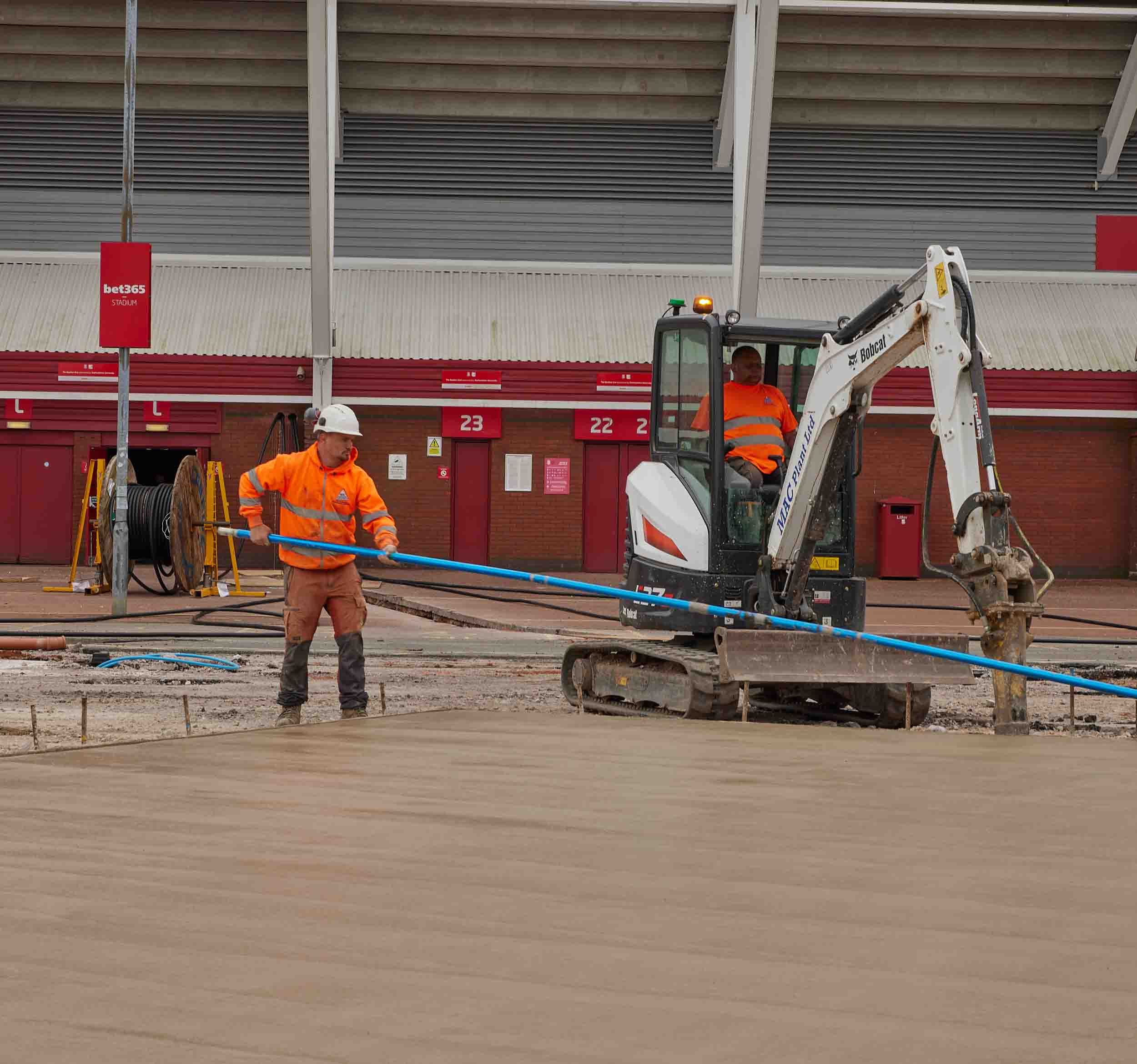 Civils and groundworks, finishing concrete foundations for commercial site at Bet365 Stadium, Stoke-on-Trent.