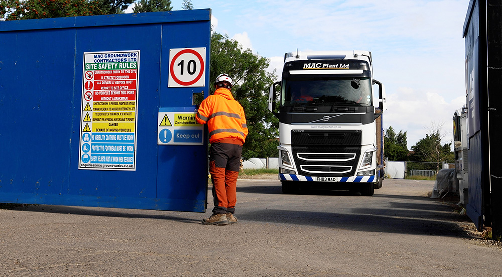 MAC Groundwork Contractors Banksman-small MAC plant wagon leaving site