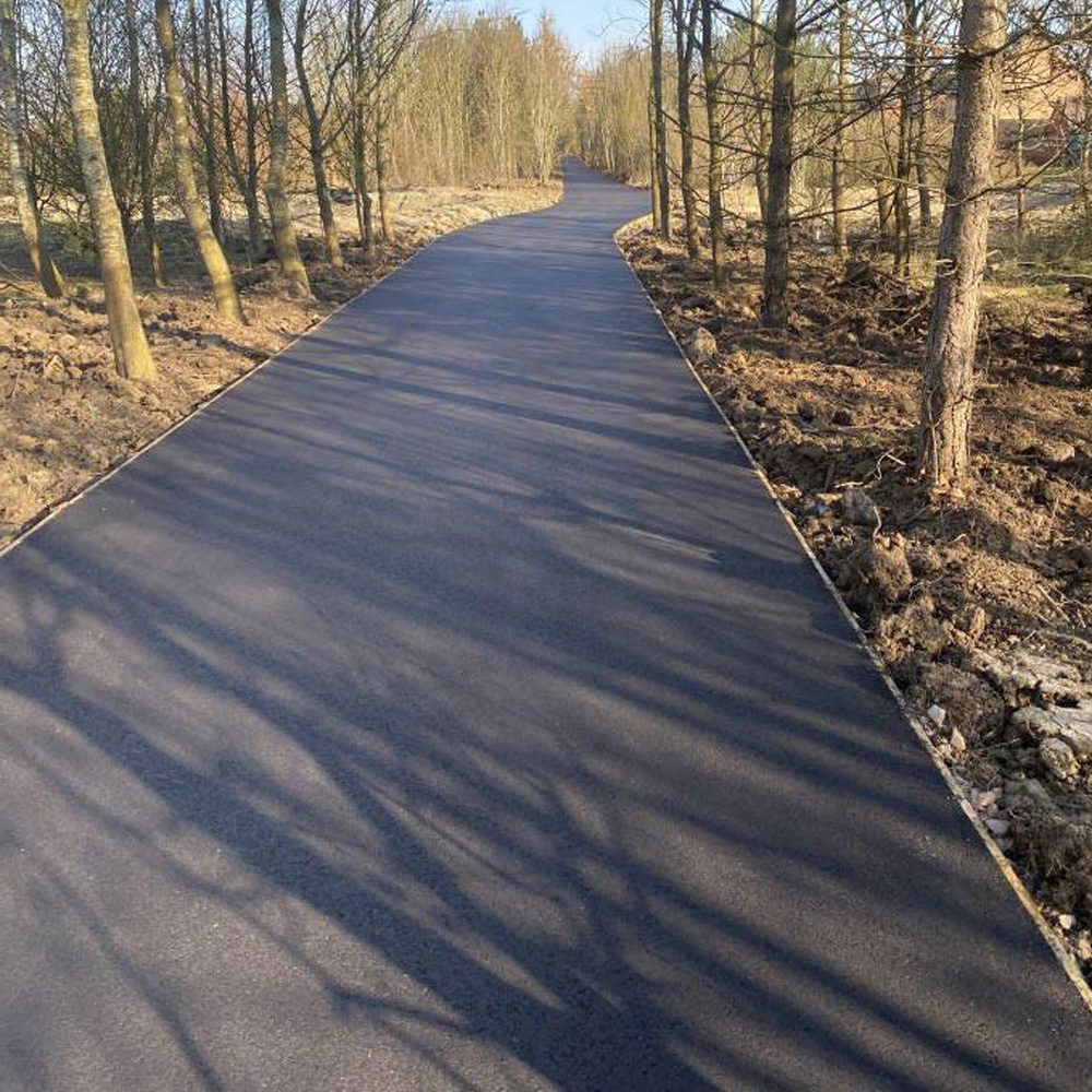 Cycle path surfacing Civils and groundworks, finishing concrete foundations for commercial site at Bet365 Stadium, Stoke-on-Trent.
