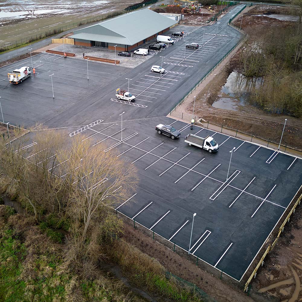 MAC Groundwork Contractors Surfacing Specialists in Asphalt Car Parks Civils and groundworks, finishing concrete foundations for commercial site at Bet365 Stadium, Stoke-on-Trent.
