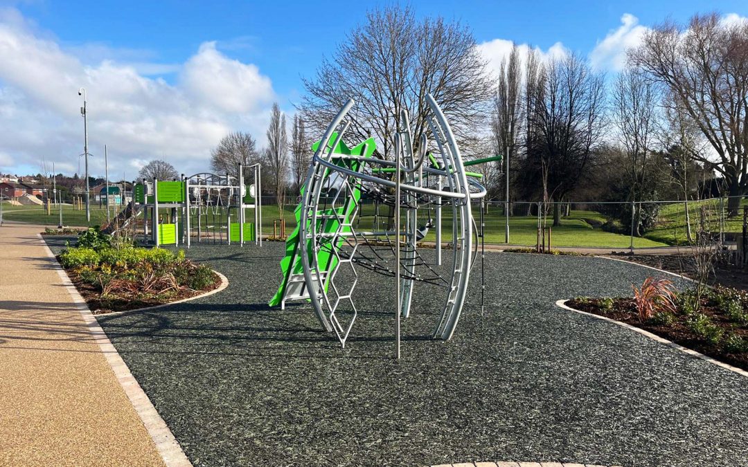 Newly installed play area climbing frame in Sileby Memorial Park with resin bond and rubber mulch surfacing.