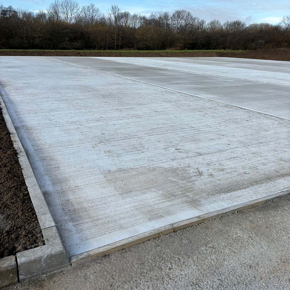 Civils and groundworks, finishing concrete foundations for commercial site at Bet365 Stadium, Stoke-on-Trent.